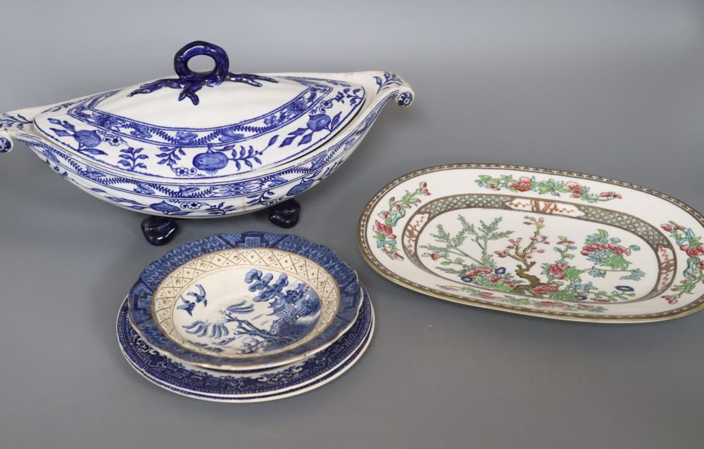 A Victorian Staffordshire blue and white sauce tureen and cover, three other pieces and a Coalport dish, painted with floral bouquets